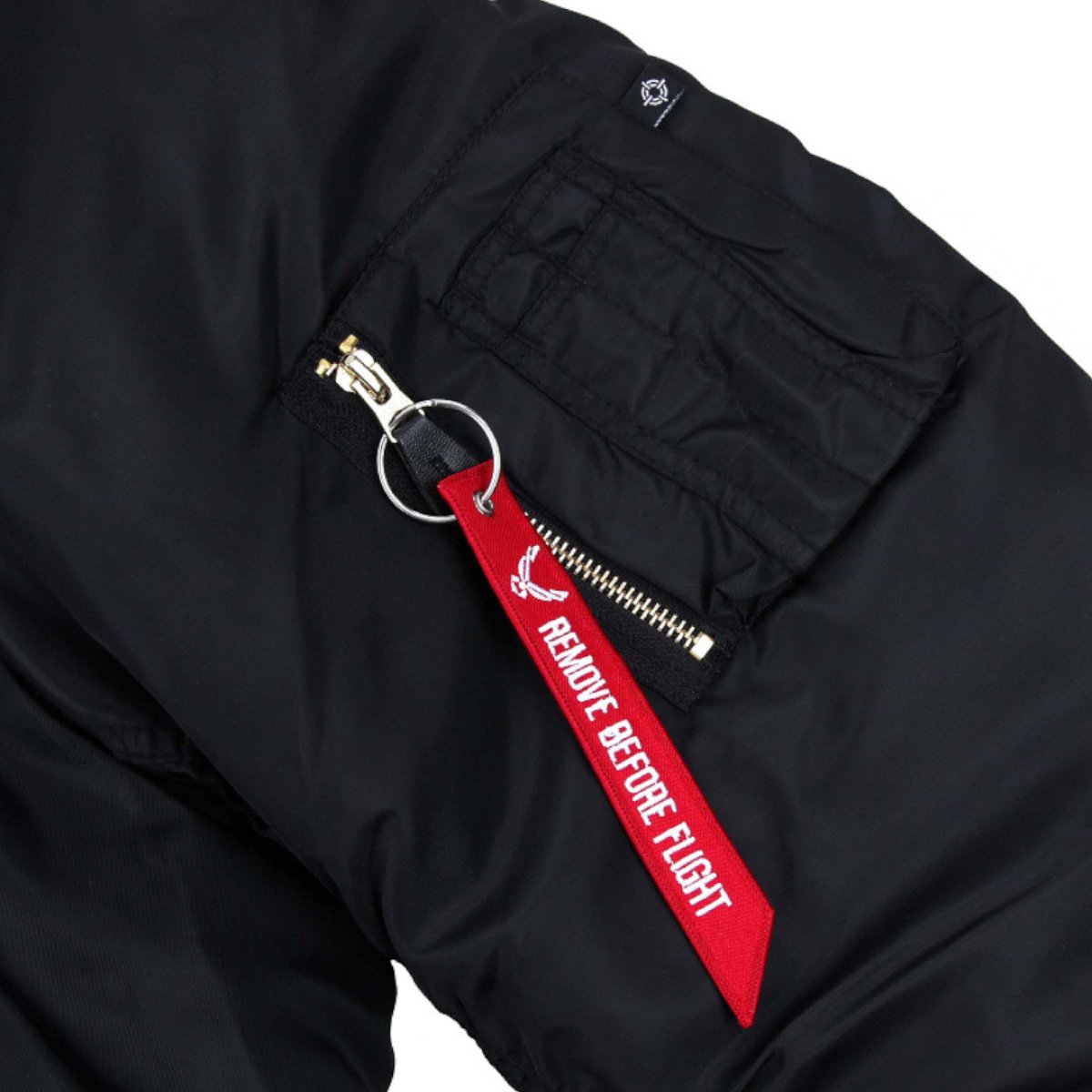 Klíčenka REMOVE BEFORE FLIGHT bomber style